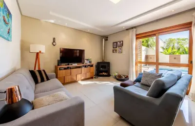 Casa em condomínio fechado com 3 quartos à venda na rua doutor jorge fayet, 636, chácara das pedras, porto alegre por r$ 1.920.000