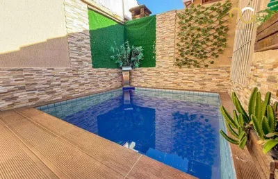 Casa com 2 dormitórios à venda, 70 m² por r$ 565.000,00 - vilamar - praia grande/sp