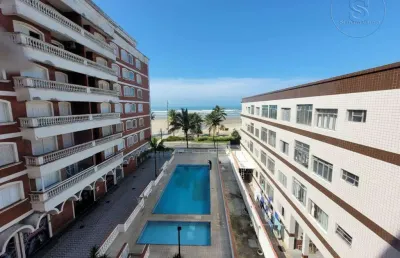 Vendo amplo apartamento frente a praia com 03 dormitórios, sacada vista mar, garagem, piscina, salão de jogos e elevador
