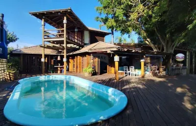 Refúgio luxuoso com praia privativa na ilha das flores