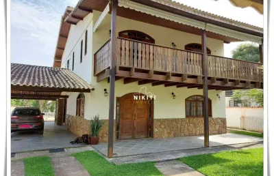 Casa com 5 dormitórios para alugar, 400 m² por r$ 4.687,00/mês - jacaroá - maricá/rj