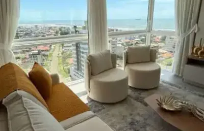 Apartamento mobiliado e decorado com vista para o mar em tramandaí