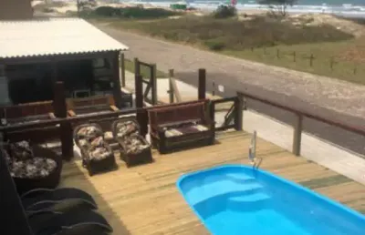 Pousada com 14 apartamentos mobiliados na av beira marem tramandaí
