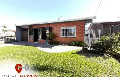Excelente casa com 05 dormitórios com localização privilegiada no centro de tramandaí