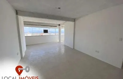 Apartamento de 2 dormitórios, sendo 1 suíte no centro de tramandaí