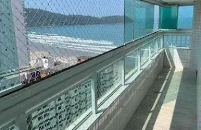 Porteira fechada e vista mar! apartamento com 3 dormitórios à venda, 140 m² por r$ 1.580.000 - vila guilhermina - praia grande/sp
