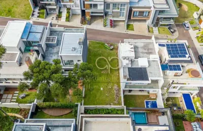Terreno com 326,66 m² no condomínio residencial park boulevard no santo inácio, a poucos passos do parque barigui, à venda por r$ 890.000,00