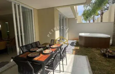 Casa com 4 dormitórios à venda, 210 m² por r$ 1.280.000,00 - loteamento alphaville campinas - campinas/sp