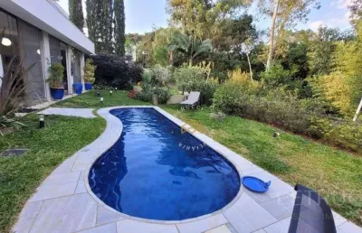 Casa com 4 dormitórios à venda, 326 m² por r$ 3.750.000,00 - condomínio reserva das palmeiras - valinhos/sp