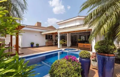 Casa com 4 dormitórios à venda, 595 m² por r$ 6.900.000,00 - loteamento alphaville campinas - campinas/sp
