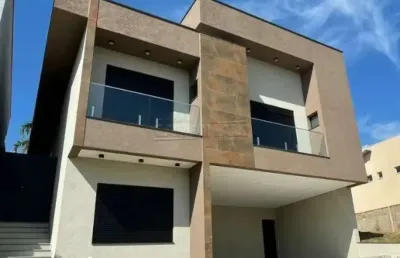 Casa espaçosa com 4 suítes e linda vista definitiva no condomínio zurich swiss park