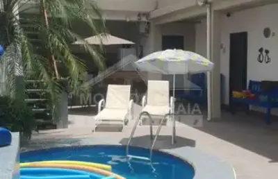 Pousada no jardim do trevo, 6 suítes, 6 vagas, piscina, confira na praia grande.