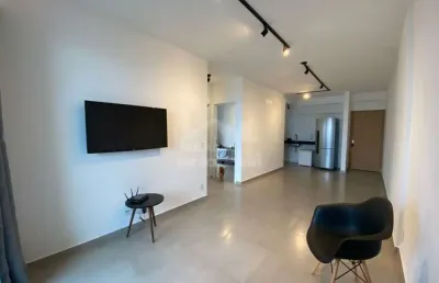 Apartamento semi mobiliado no forte, 2 dormitórios, sacada gourmet, confira em praia grande.