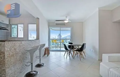 Andar alto com vista para o mar na praia da enseada, com 4 suítes e condomínio clube