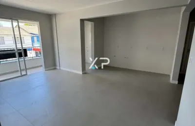 Apartamento no centro de palhoça com 3 quartos sendo 1 suíte,2 banheiros e 1 vaga de garagem