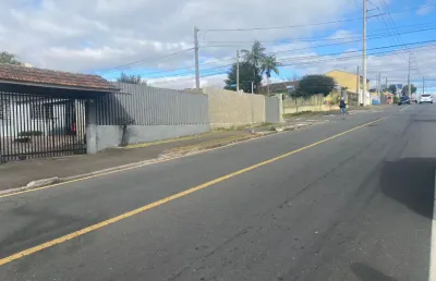 Terreno com 407 m² com duas casas no capão raso, área construída de 180m² - cód. 04.005