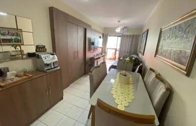 Lindo apartamento no canto do forte com sacada vista livre excelente localização.