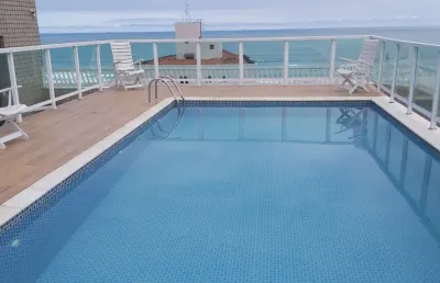 Lindo apartamento na aviação em praia grande vista pro mar e lazer.