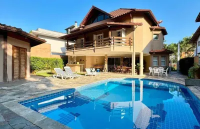 Casa em condomínio fechado com 5 quartos para alugar na Avenida São Lourenço, 432, Riviera de São Lourenço, Bertioga