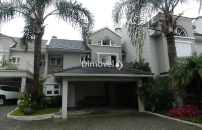 Casa em condomínio fechado com 3 quartos à venda na avenida coronel marcos, 483, pedra redonda, porto alegre por r$ 1.350.000