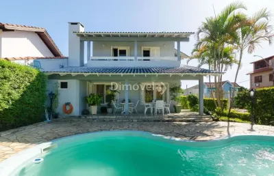 Casa com 4 quartos à venda na rua paulo derly strehl, 187, ipanema, porto alegre por r$ 900.000