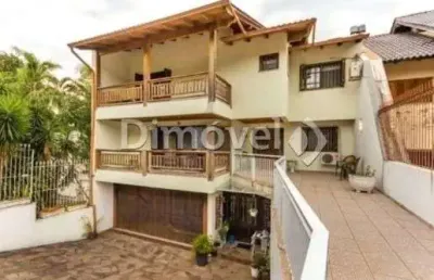 Casa com 4 quartos à venda na rua caeté, 600, vila assunção, porto alegre por r$ 1.590.000