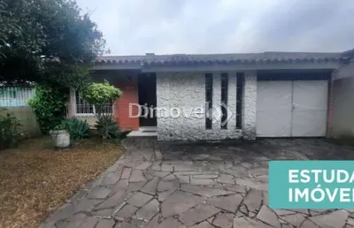 Casa com 4 quartos à venda na rua doutor barcelos, 1970, camaquã, porto alegre por r$ 750.000