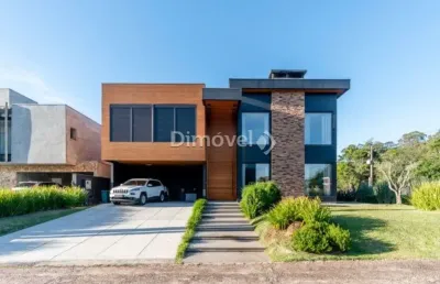 Casa em condomínio fechado com 5 quartos à venda na avenida juca batista, 8000, belém novo, porto alegre por r$ 3.800.000