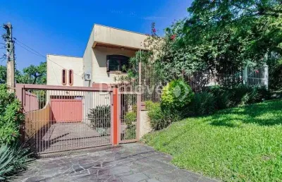 Casa com 4 quartos à venda na avenida capivari, 165, cristal, porto alegre por r$ 997.500