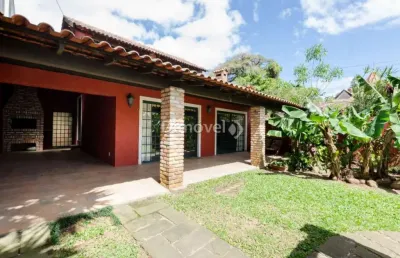 Casa com 2 quartos à venda na avenida guaíba, 4040, vila assunção, porto alegre por r$ 1.200.000