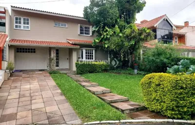 Casa em condomínio fechado com 4 quartos à venda na avenida juca batista, 1200, ipanema, porto alegre por r$ 1.190.000