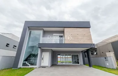 Casa em condomínio fechado com 4 quartos à venda na estrada das três meninas, 1400, vila nova, porto alegre por r$ 2.490.000