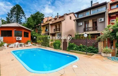 Casa em condomínio fechado com 3 quartos à venda na rua landel de moura, 744, tristeza, porto alegre por r$ 899.000