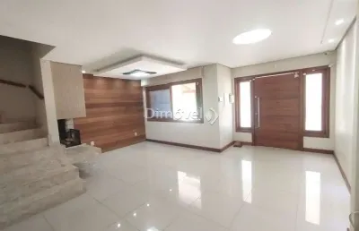 Casa com 3 quartos à venda na rua carlos maximiliano fayet, 339, hípica, porto alegre por r$ 980.000