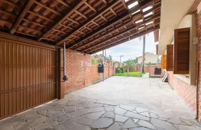 Casa com 3 quartos à venda na rua oiampi, 420, guarujá, porto alegre por r$ 490.000