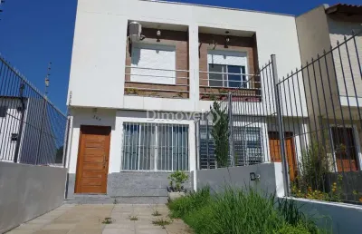 Casa com 2 quartos à venda na rua ilari arlindo basei, 204, guarujá, porto alegre por r$ 420.000