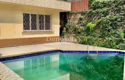 Casa com 4 quartos à venda na rua guaraum, 286, vila assunção, porto alegre por r$ 1.690.000