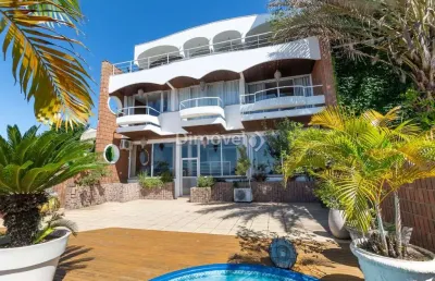 Casa com 4 quartos à venda na rua bororó, 25, vila assunção, porto alegre por r$ 4.240.000