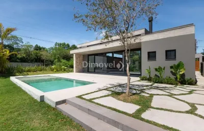 Casa em condomínio fechado com 4 quartos à venda na avenida juca batista, 8000, belém novo, porto alegre por r$ 4.450.000