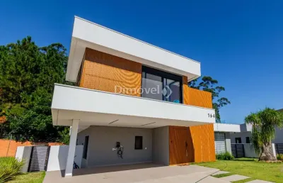 Casa em condomínio fechado com 5 quartos à venda na estrada das três meninas, 1400, vila nova, porto alegre por r$ 3.100.000