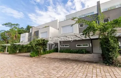Casa em condomínio fechado com 3 quartos à venda na rua doutor ney de castilhos ferreira, 300, pedra redonda, porto alegre por r$ 2.500.000