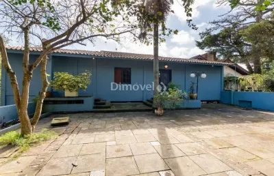 Casa com 4 quartos à venda na rua simão bolívar, 455, vila conceição, porto alegre por r$ 950.000
