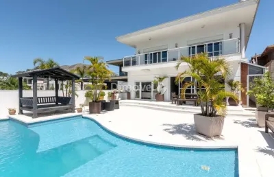 Casa em condomínio fechado com 4 quartos à venda na avenida juca batista, 8000, belém novo, porto alegre por r$ 4.250.000