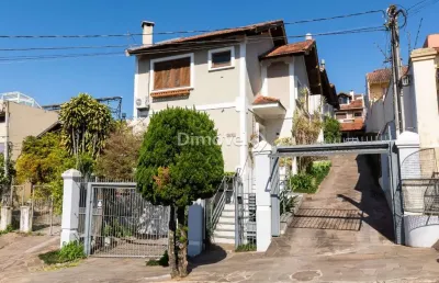 Casa em condomínio fechado com 3 quartos à venda na rua padre joão batista reus, 2083, tristeza, porto alegre por r$ 680.000