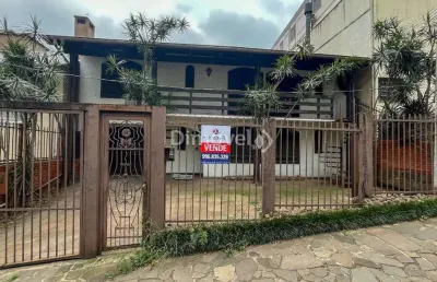 Casa com 5 quartos à venda na rua doutor mário totta, 1170, tristeza, porto alegre por r$ 790.000