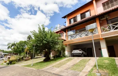 Casa em condomínio fechado com 4 quartos à venda na rua álvaro guterres, 707, tristeza, porto alegre por r$ 1.300.000