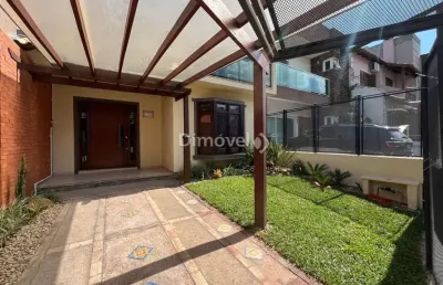Casa em condomínio fechado com 3 quartos à venda na rua roberto santini, 194, hípica, porto alegre por r$ 650.000
