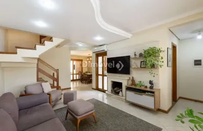 Casa com 3 quartos à venda na avenida copacabana, 133, vila assunção, porto alegre por r$ 1.300.000