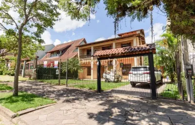 Casa com 5 quartos à venda na rua doutor pitrez, 99, ipanema, porto alegre por r$ 750.000