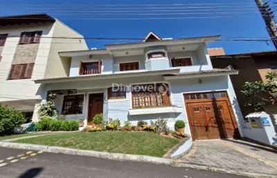 Casa em condomínio fechado com 4 quartos à venda na avenida vicente monteggia, 2000, cavalhada, porto alegre por r$ 1.290.000